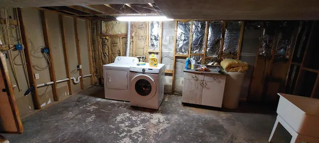 a bathroom with sink and mirror