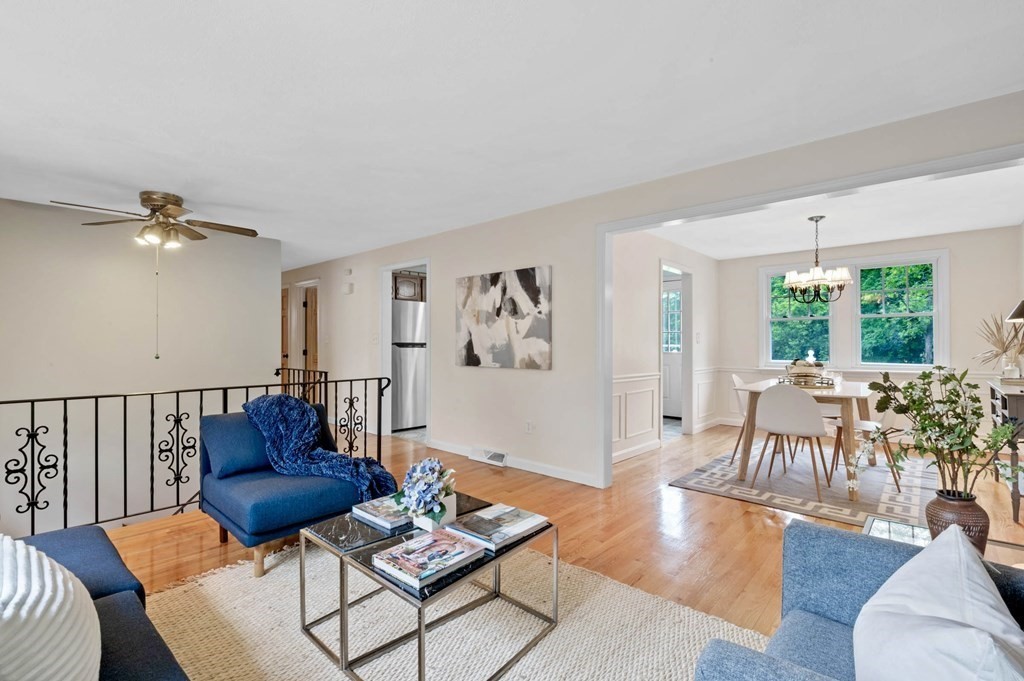 10 Wyman Road Billerica, MA 01821 - Photo 3 of 33 a living room with furniture and wooden floor