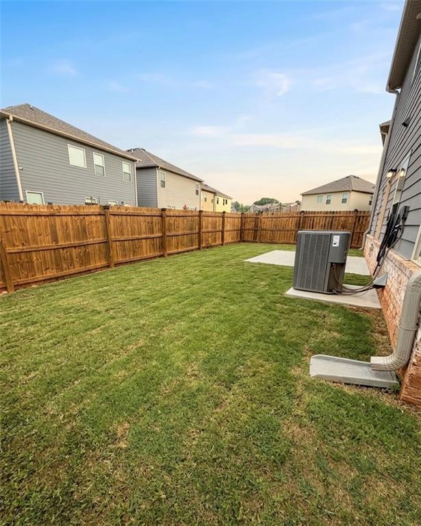 11644 Stovall Place Hampton, GA 30228 - Photo 3 of 18 a view of a backyard