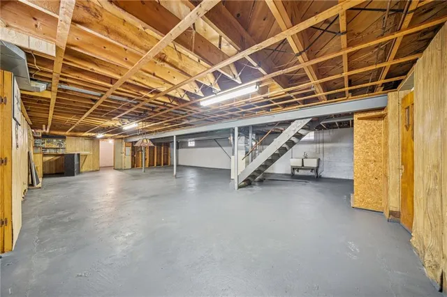 a view of an empty room with a garage