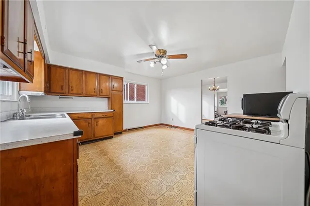 a bedroom with furniture and a flat screen tv