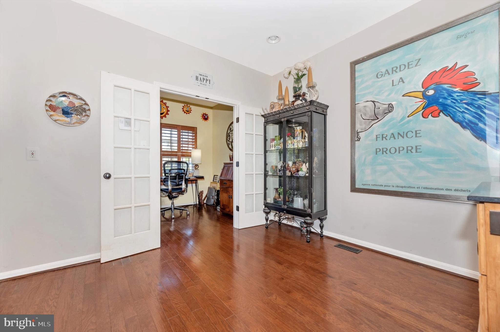 2490 Lakeside Drive Frederick, MD 21702 - Photo 12 of 31 Dining Area into Sunroom