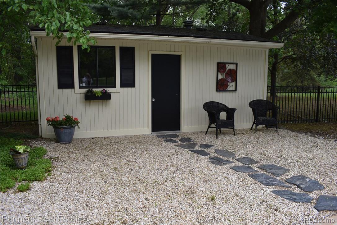 4400 Golf Club Road Howell, MI 48843 - Photo 14 of 68 Pool house for pool equipment and storage