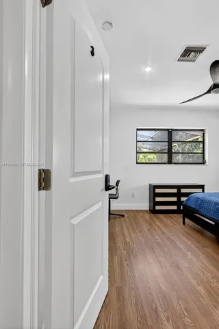 a view of a livingroom with furniture and wooden floor