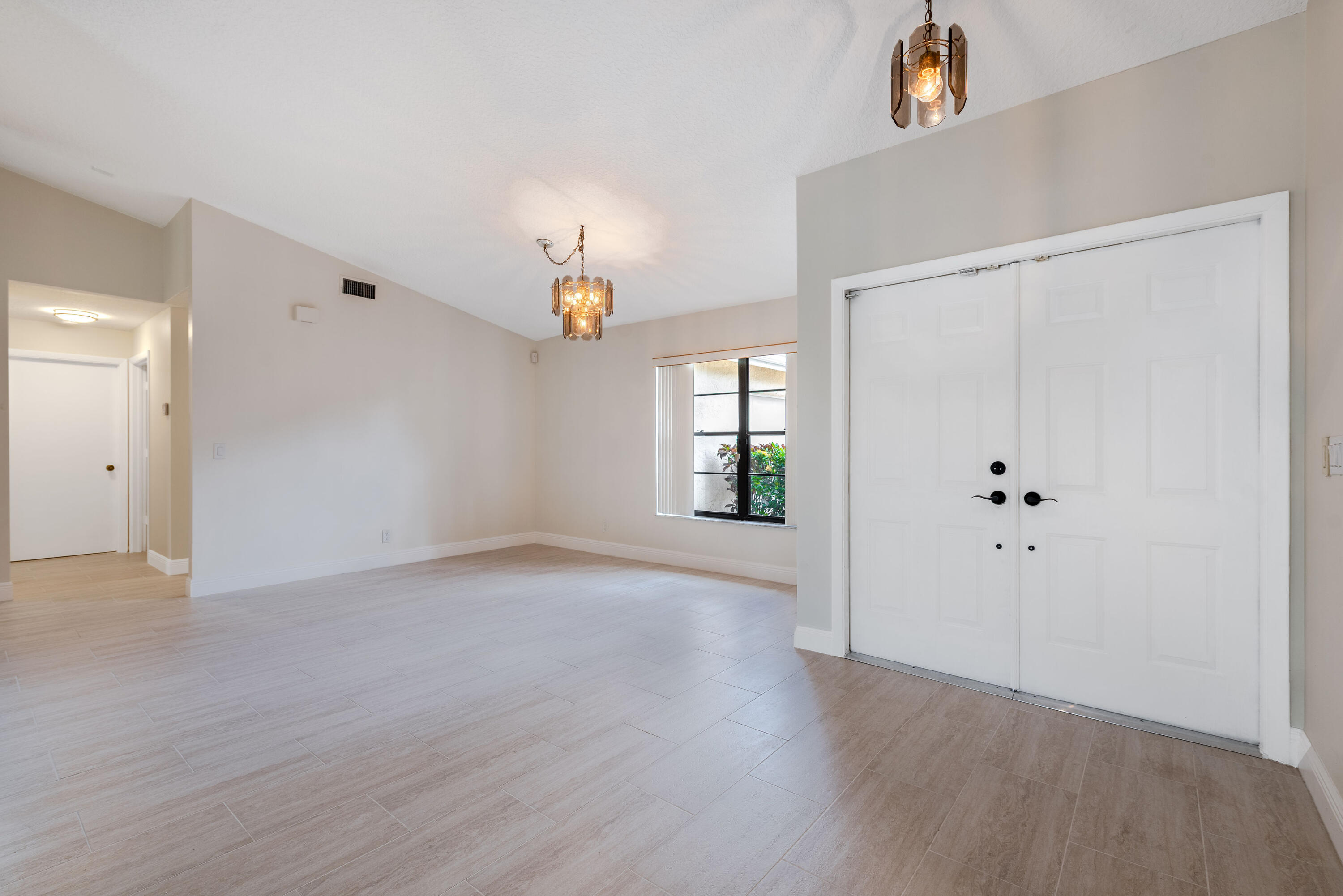 8686 Eagle Run Drive Boca Raton, FL 33434 - Photo 6 of 41 Foyer/Dining Rm