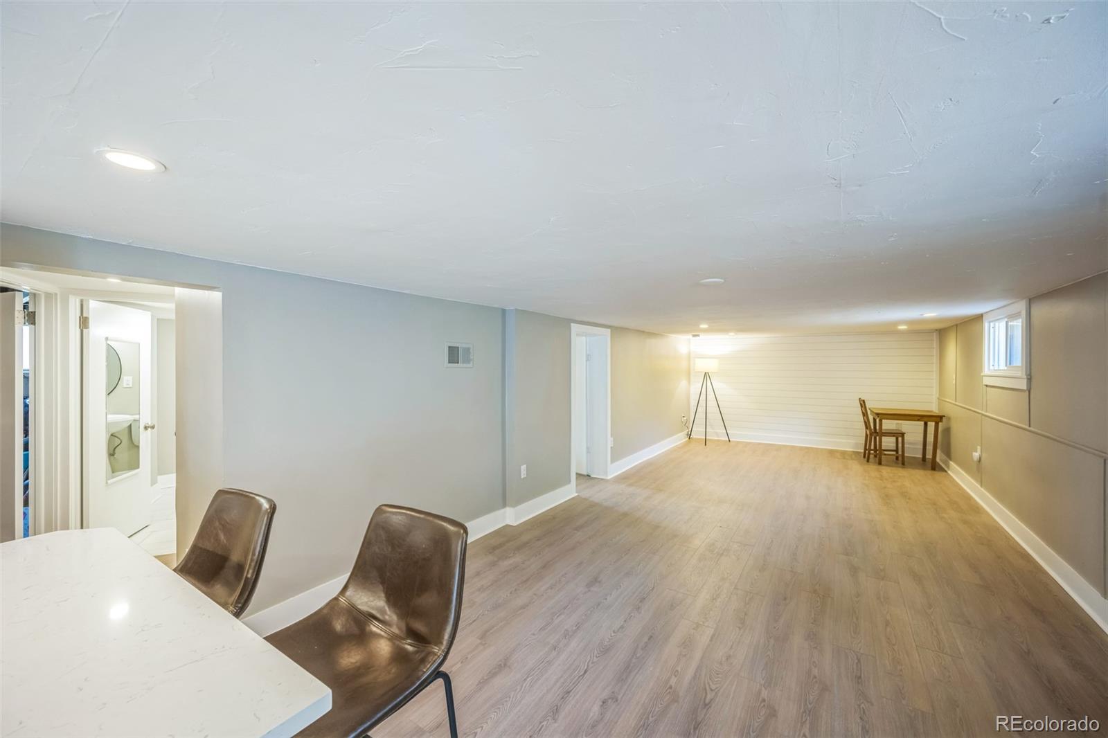 7340 West 32nd Avenue Wheat Ridge, CO 80033 - Photo 20 of 35 a furnished livingroom with a large window
