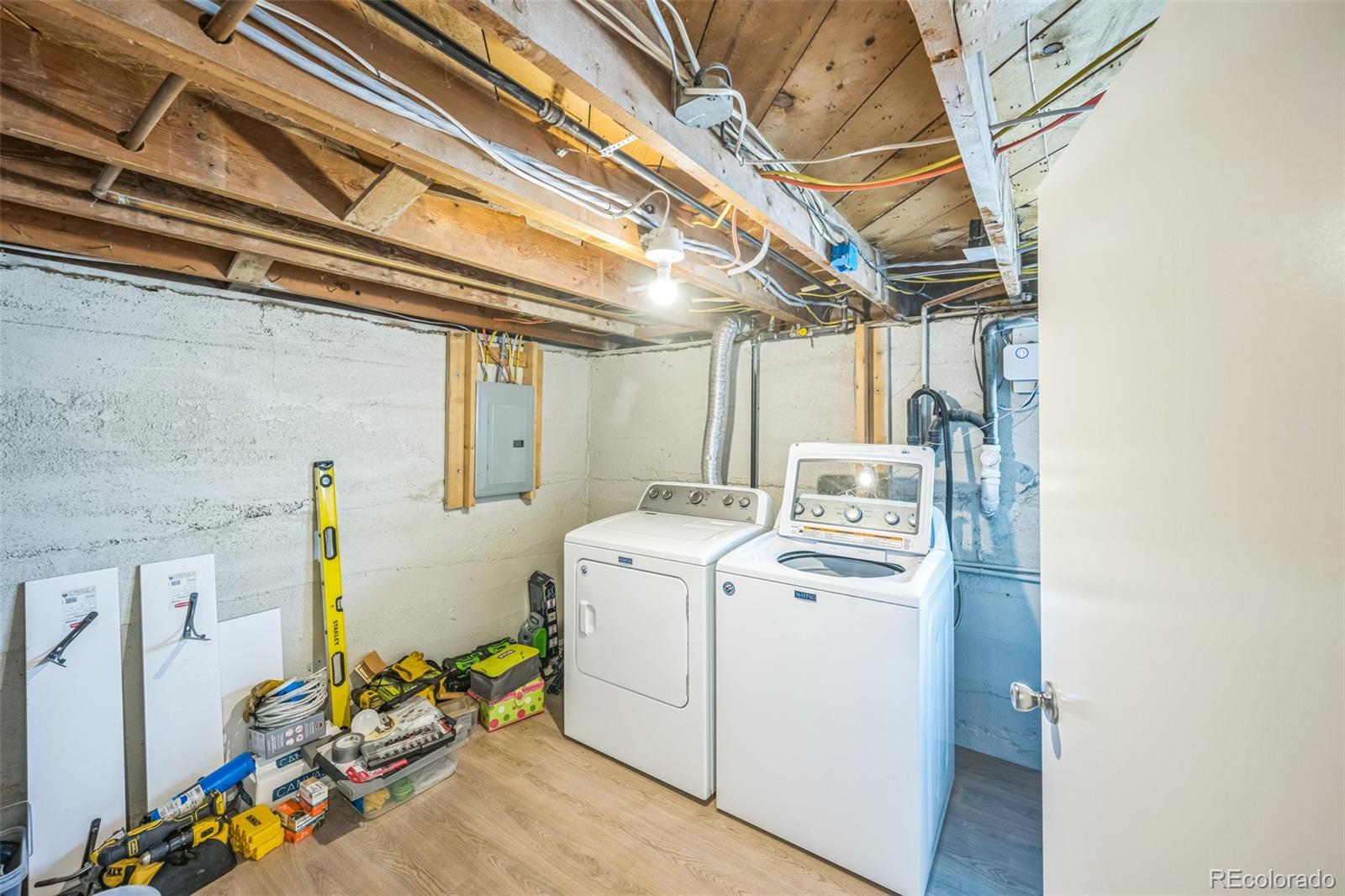 7340 West 32nd Avenue Wheat Ridge, CO 80033 - Photo 25 of 35 a utility room with dryer and washer