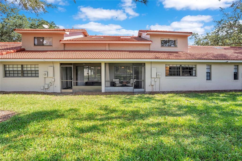 7736 Windbreak Road Orlando, FL 32819 - Photo 32 of 43 front view of a building