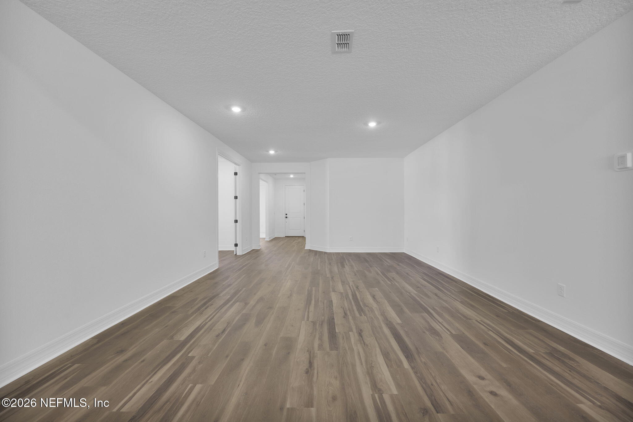4896 Shell Crk Trail Jacksonville, FL 32226 - Photo 12 of 27 a view of empty room with wooden floor