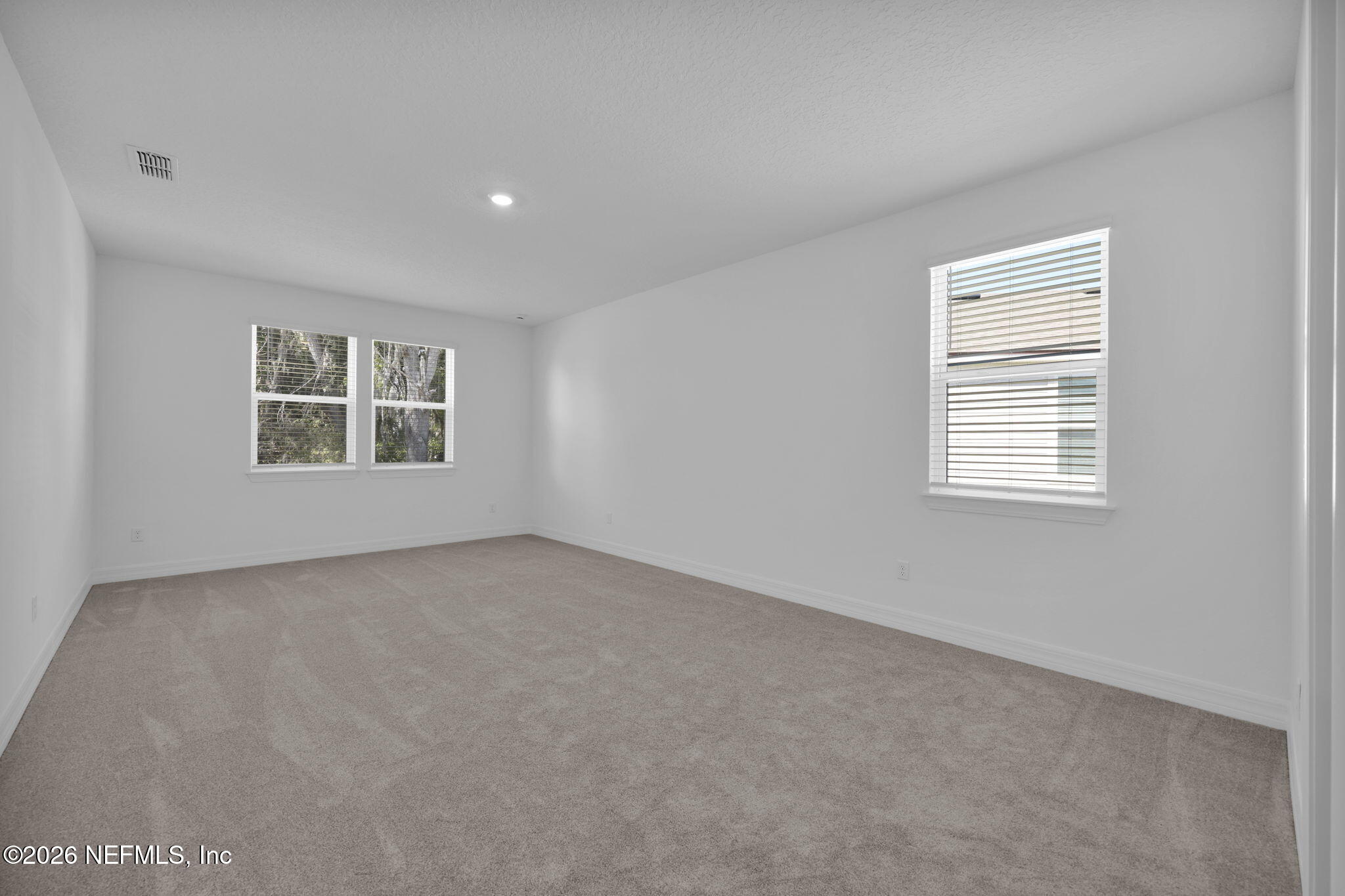 4896 Shell Crk Trail Jacksonville, FL 32226 - Photo 19 of 27 an empty room with a window