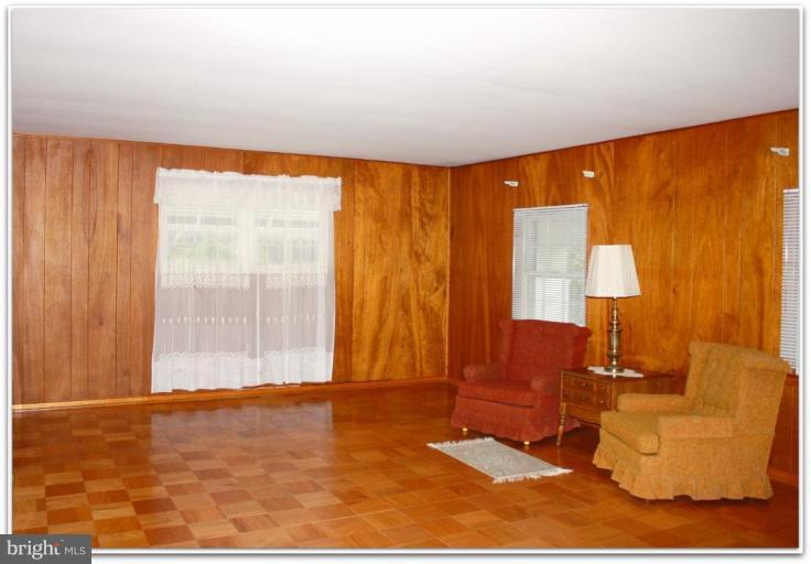 3115 Holland Cliffs Road Huntingtown, MD 20639 - Photo 10 of 13 a view of an empty room and window