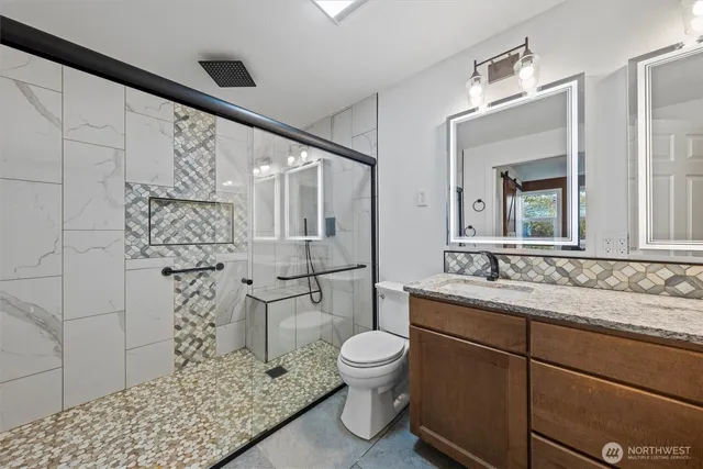 a view of a big room with red carpet