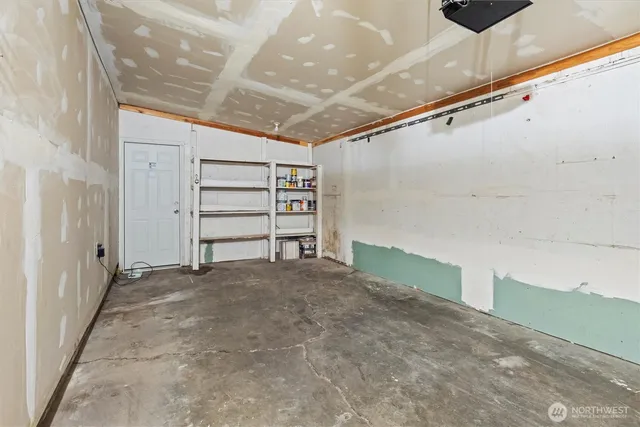 an aerial view of residential building with green space