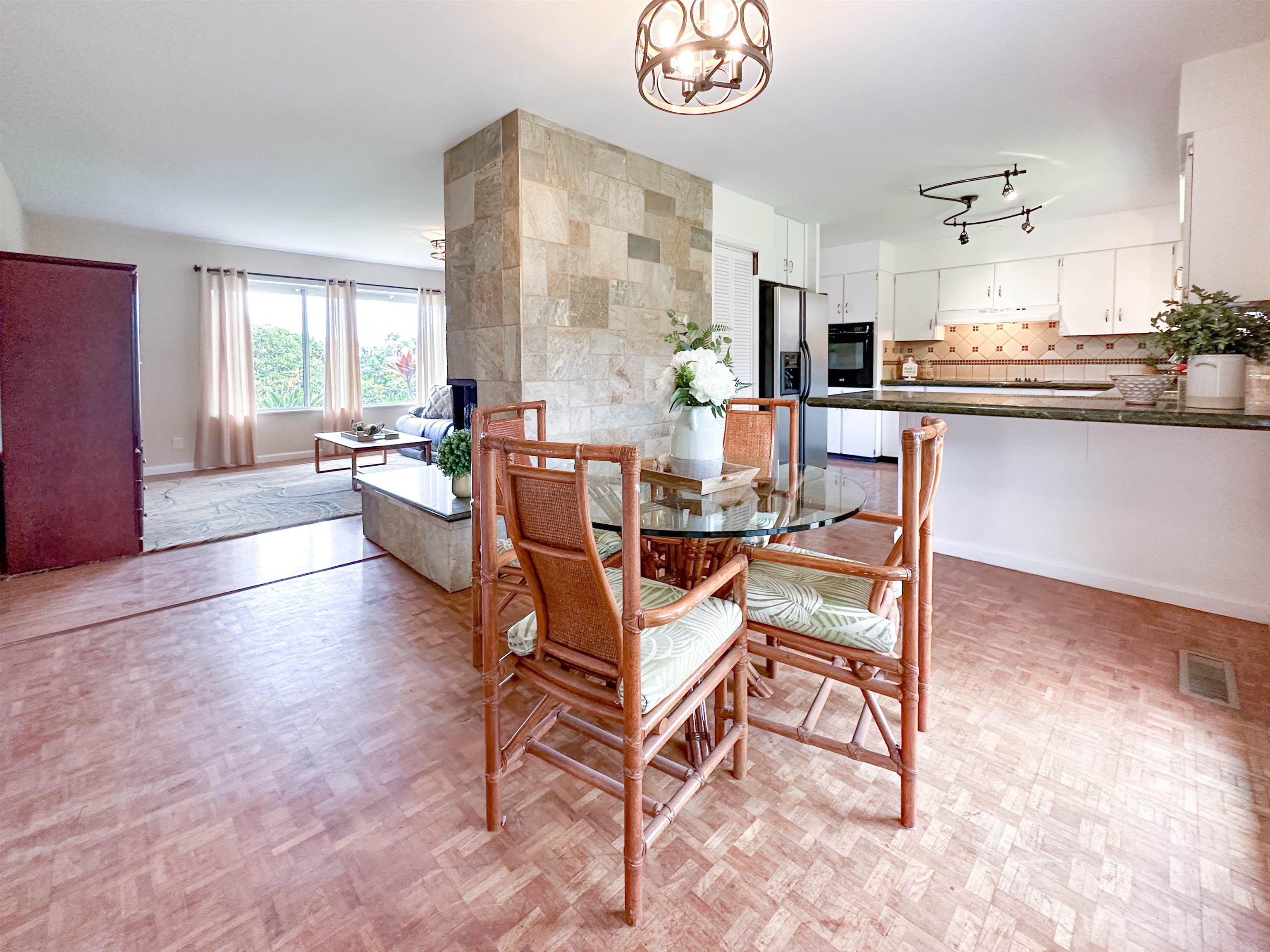 1875 Lower Kula Road Kula, HI 96790 - Photo 12 of 36 a dining room with furniture and window