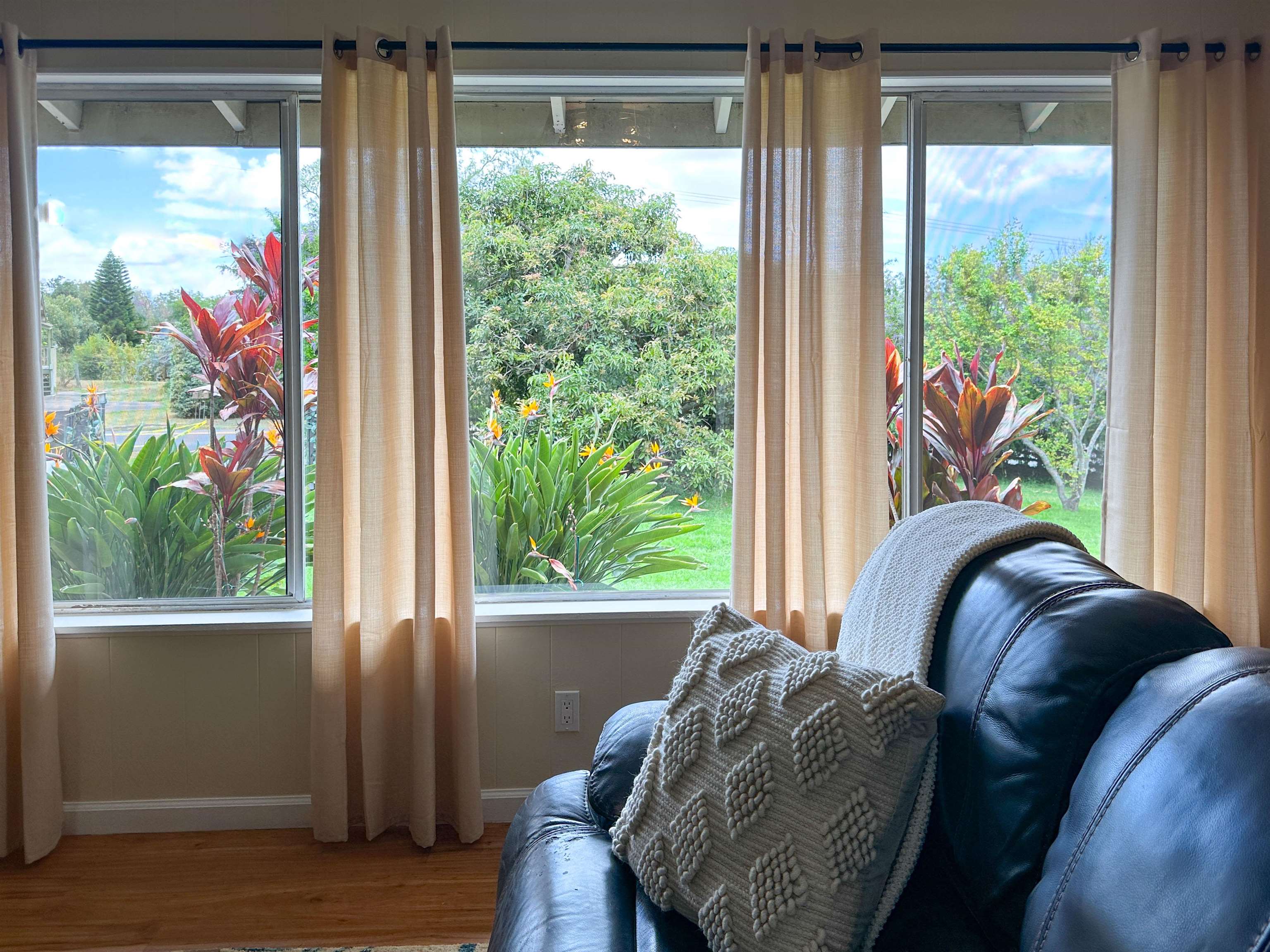 1875 Lower Kula Road Kula, HI 96790 - Photo 16 of 36 a living room with furniture and a large window