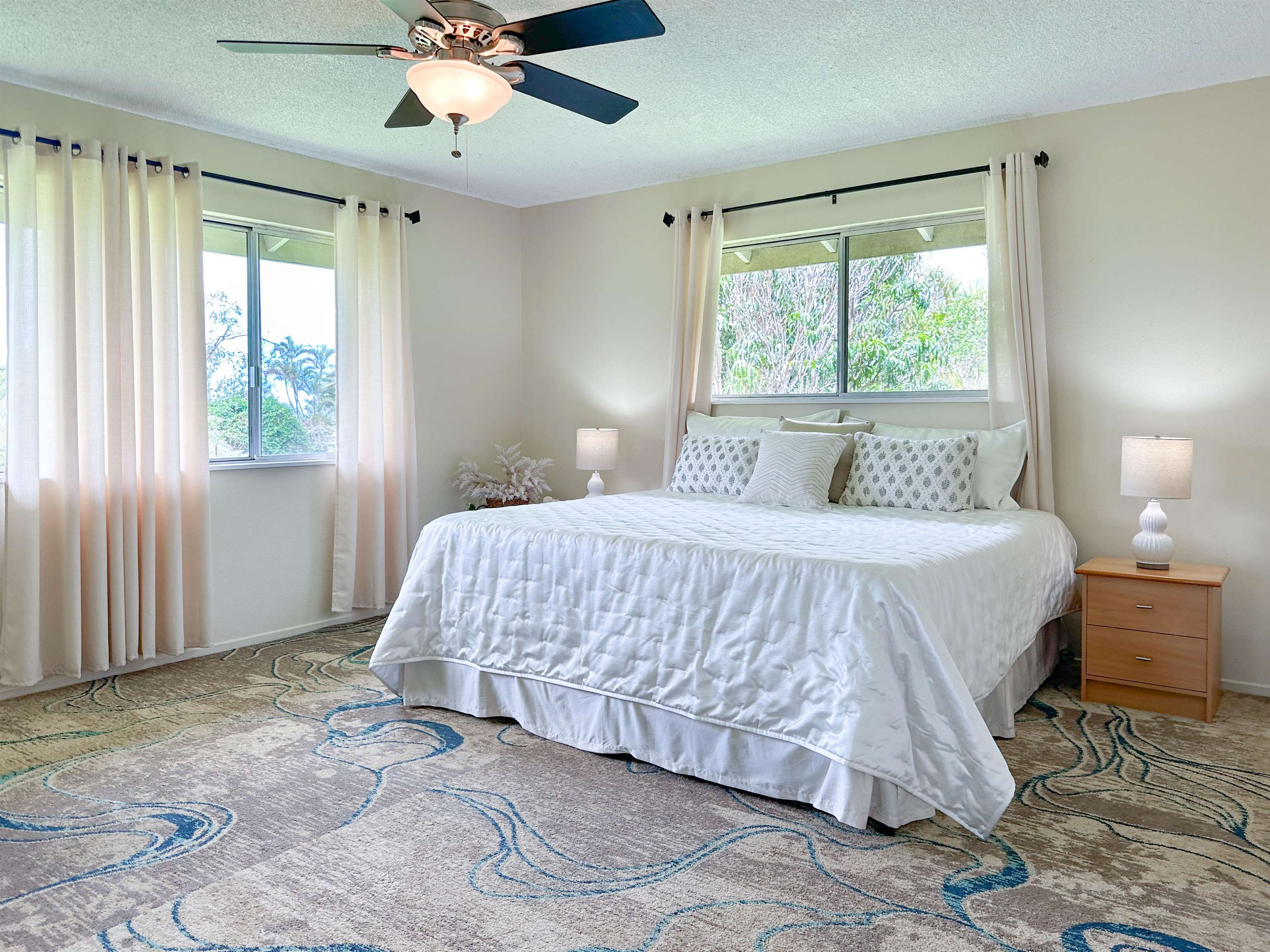 1875 Lower Kula Road Kula, HI 96790 - Photo 21 of 36 a bedroom with a bed and window