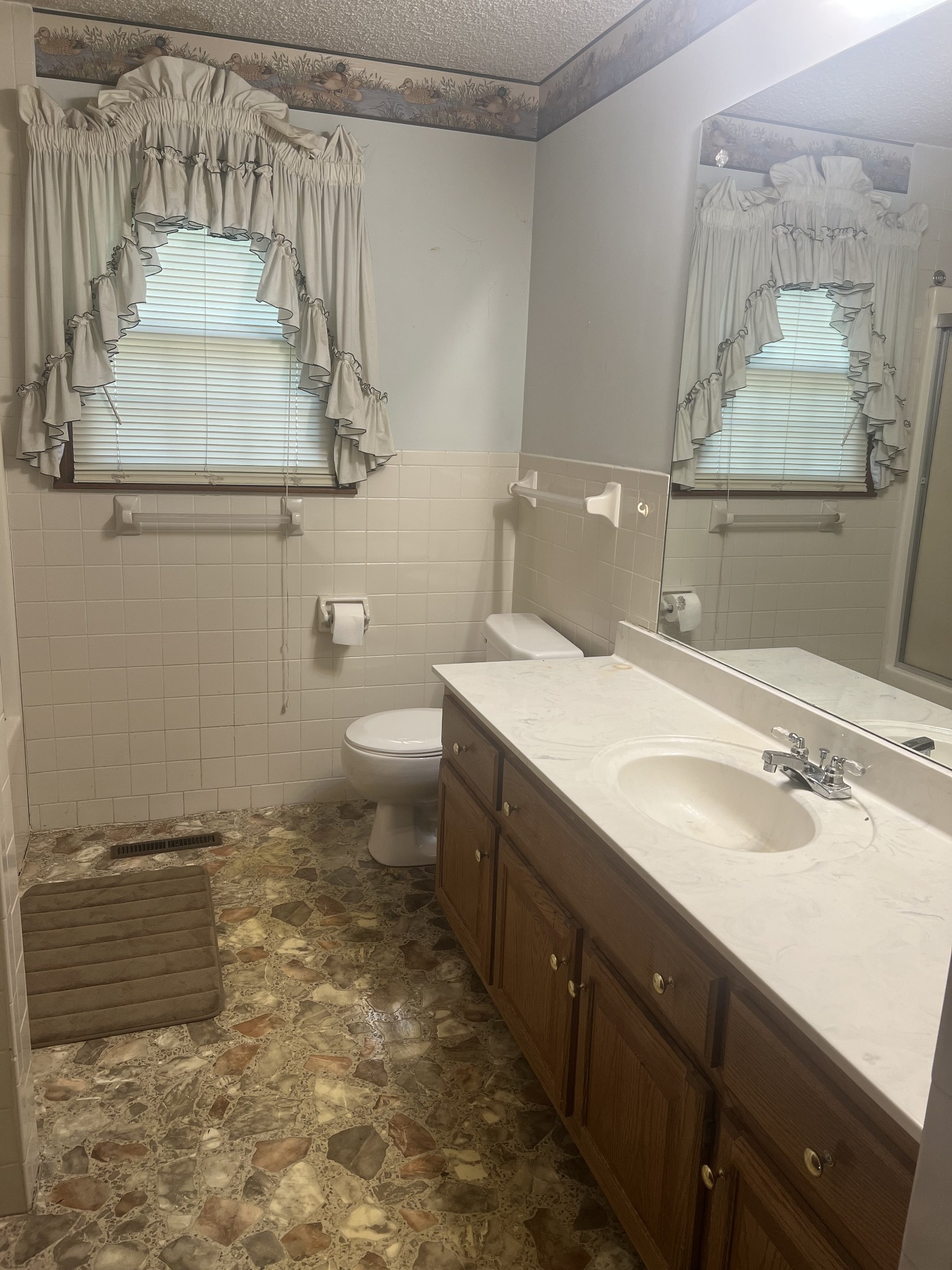 170 Turkey Creek Road Carthage, TN 37030 - Photo 18 of 23 a bathroom with a sink toilet and mirror