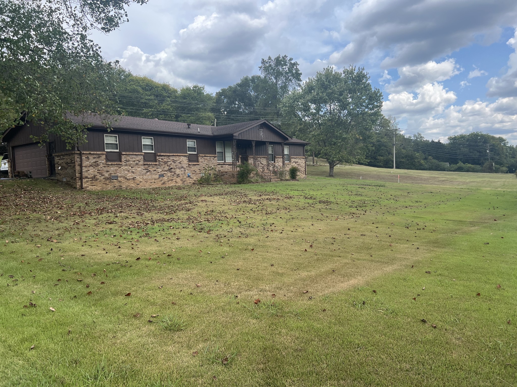 170 Turkey Creek Road Carthage, TN 37030 - Photo 2 of 23 a backyard of a house with lots of green space