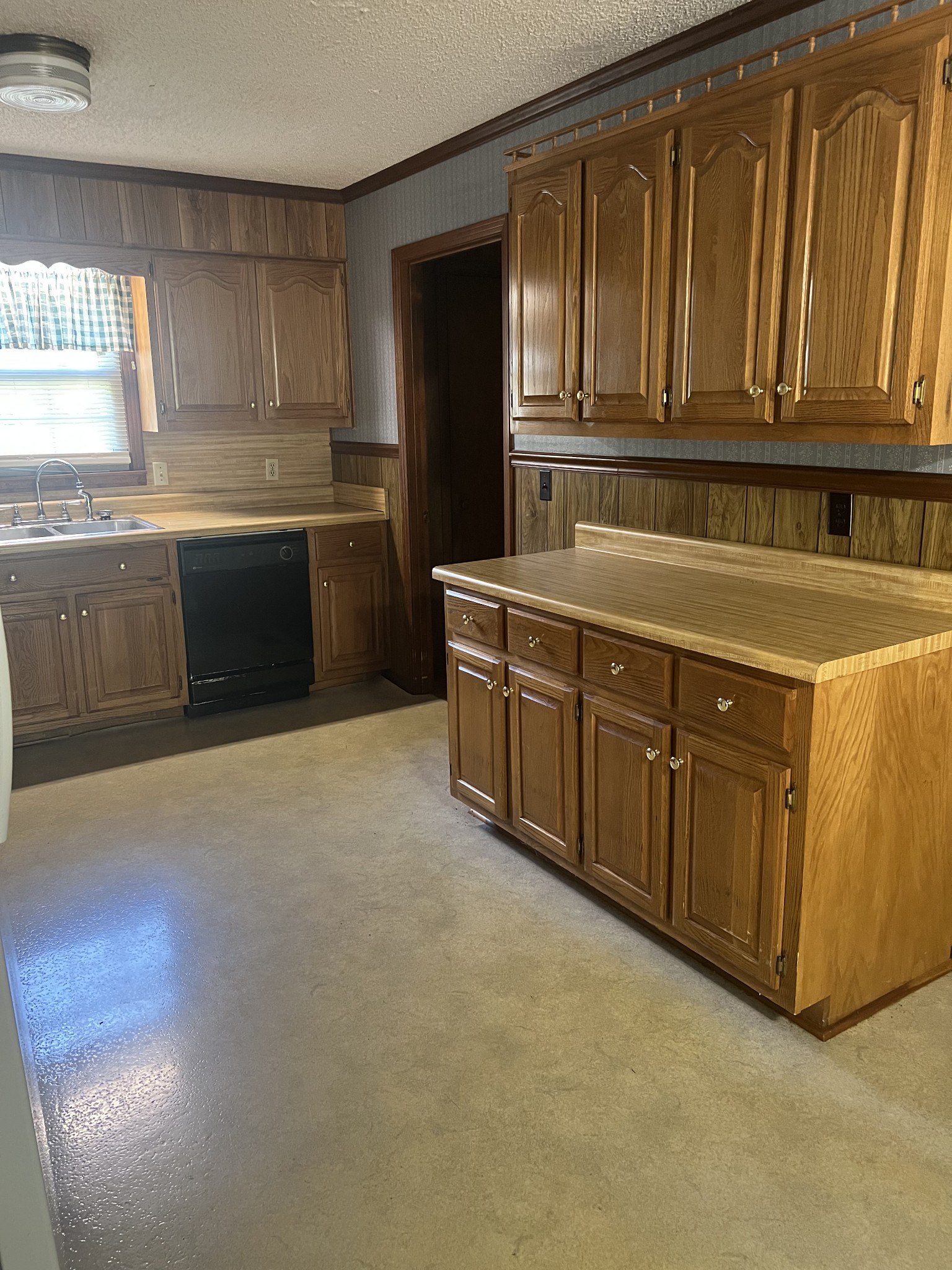 170 Turkey Creek Road Carthage, TN 37030 - Photo 10 of 23 a kitchen with stainless steel appliances granite countertop a stove sink and cabinets