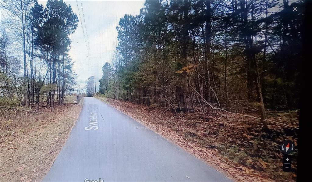 0 Sweetwater Church Road Dawsonville, GA 30534 - Photo 4 of 9 a backyard of a house with lots of green space