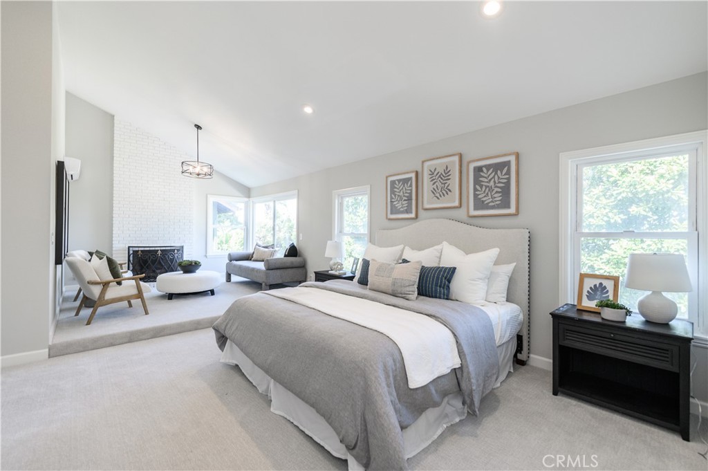 7 Jamestown Irvine, CA 92620 - Photo 5 of 7 a bedroom with bed couch and window