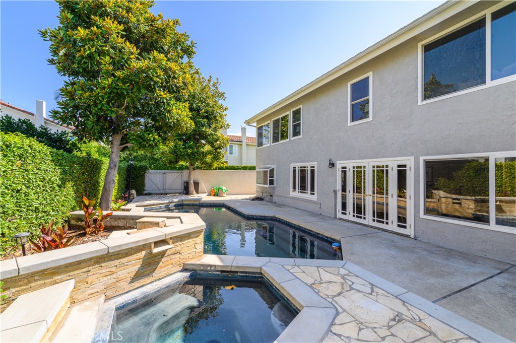 7 Jamestown Irvine, CA 92620 - Photo 7 of 7 a view of a house with backyard sitting area