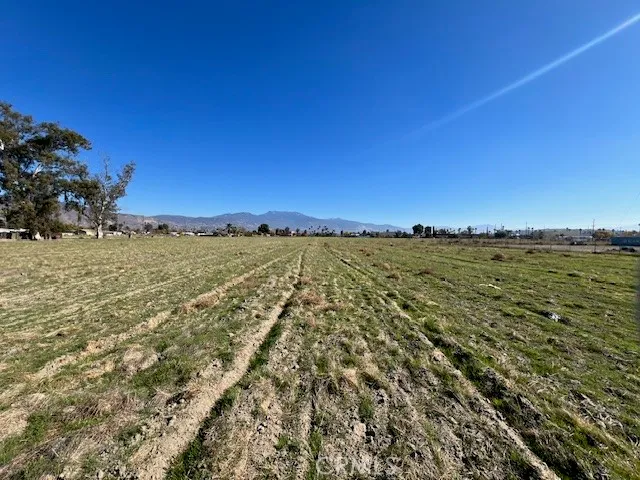 a view of a road with a building in the background