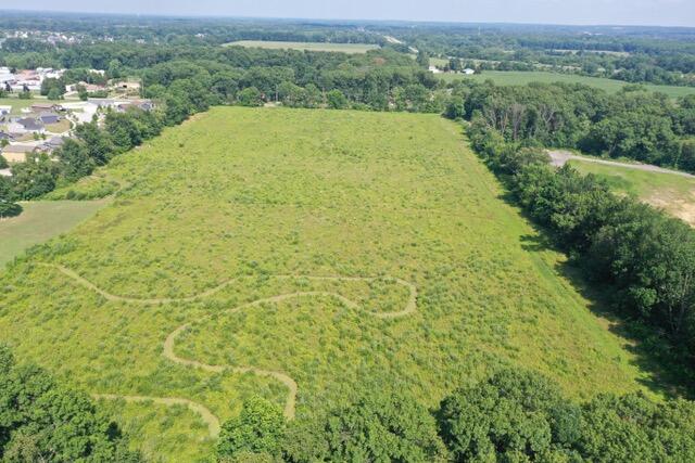 0 St Road Portage, IN 46368 - Photo 4 of 8 a view of a big yard with lots of green space and mountain view in back