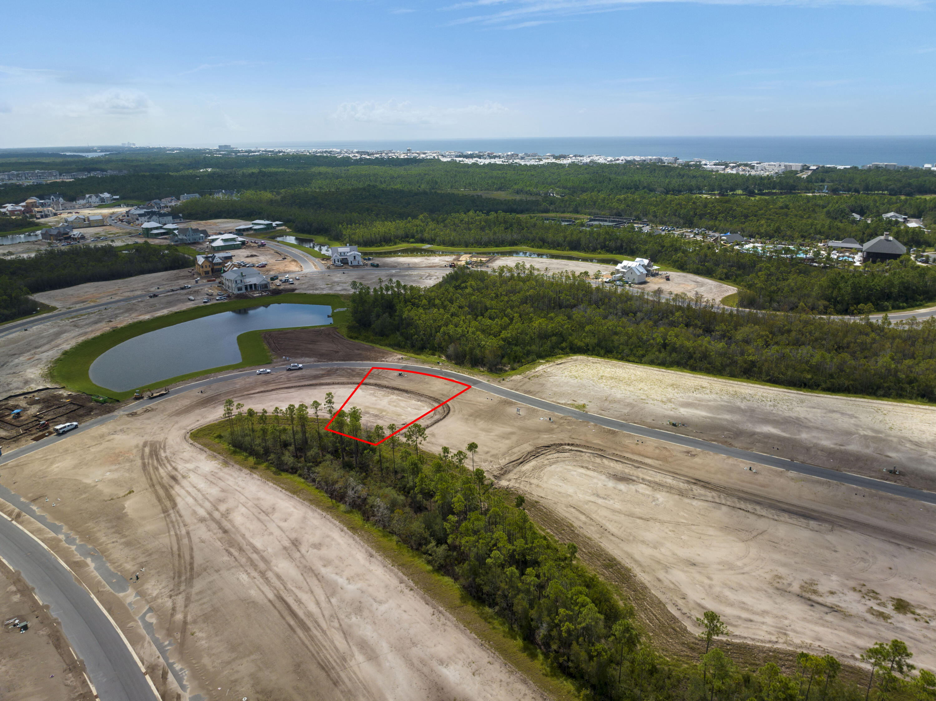 Lot 67 Sancord Dr Inlet Beach Inlet Beach, FL 32461 - Photo 14 of 22 an aerial view of a house with a yard and lake view