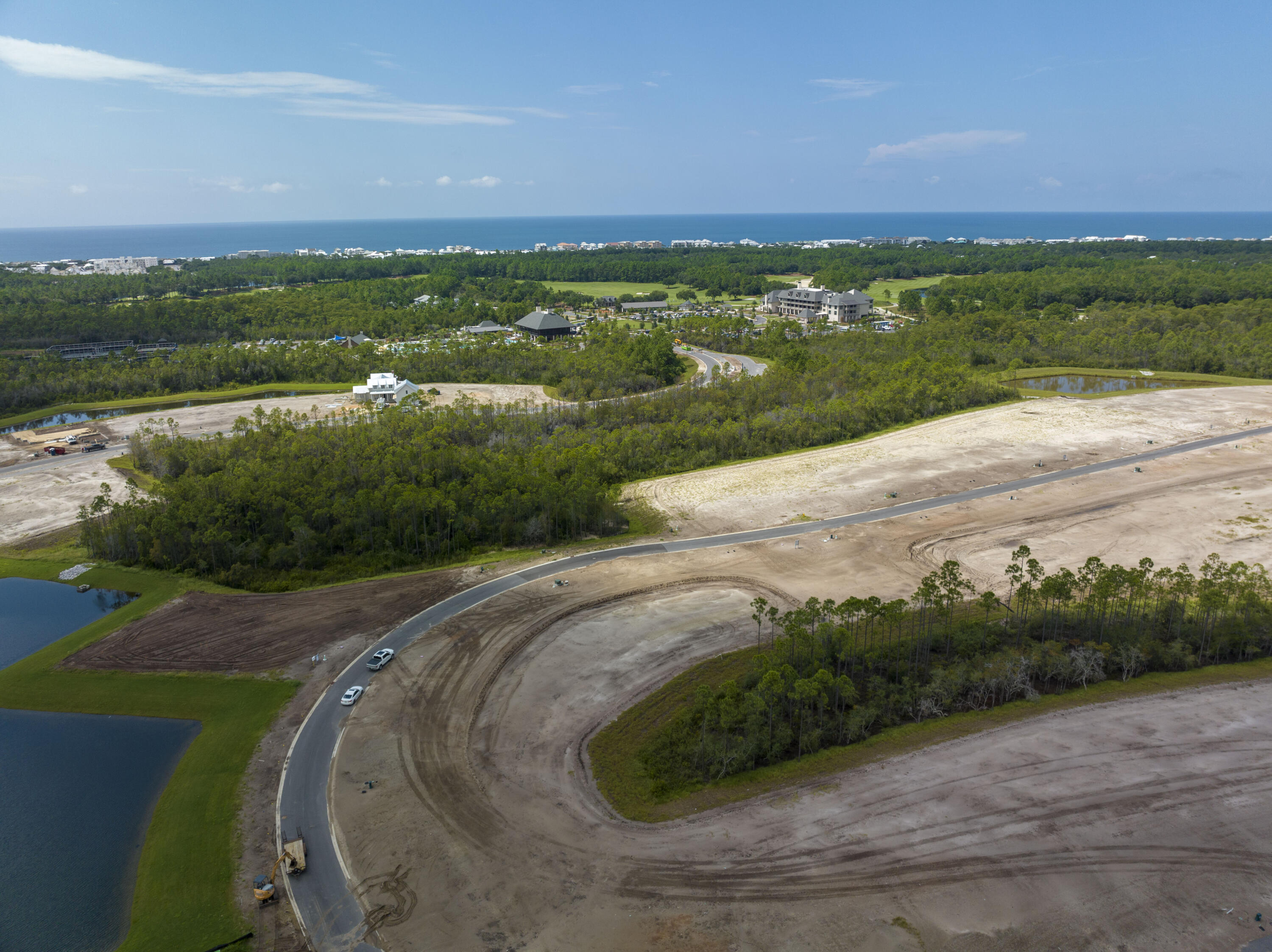 Lot 67 Sancord Dr Inlet Beach Inlet Beach, FL 32461 - Photo 19 of 22 an aerial view of a house with a yard and lake view