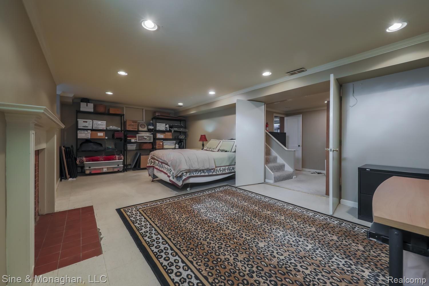 1179 Whittier Road Grosse Pointe, MI 48230 - Photo 33 of 59 1179 Whittier Rd BASEMENT REC ROOM TO HALL.jpg
