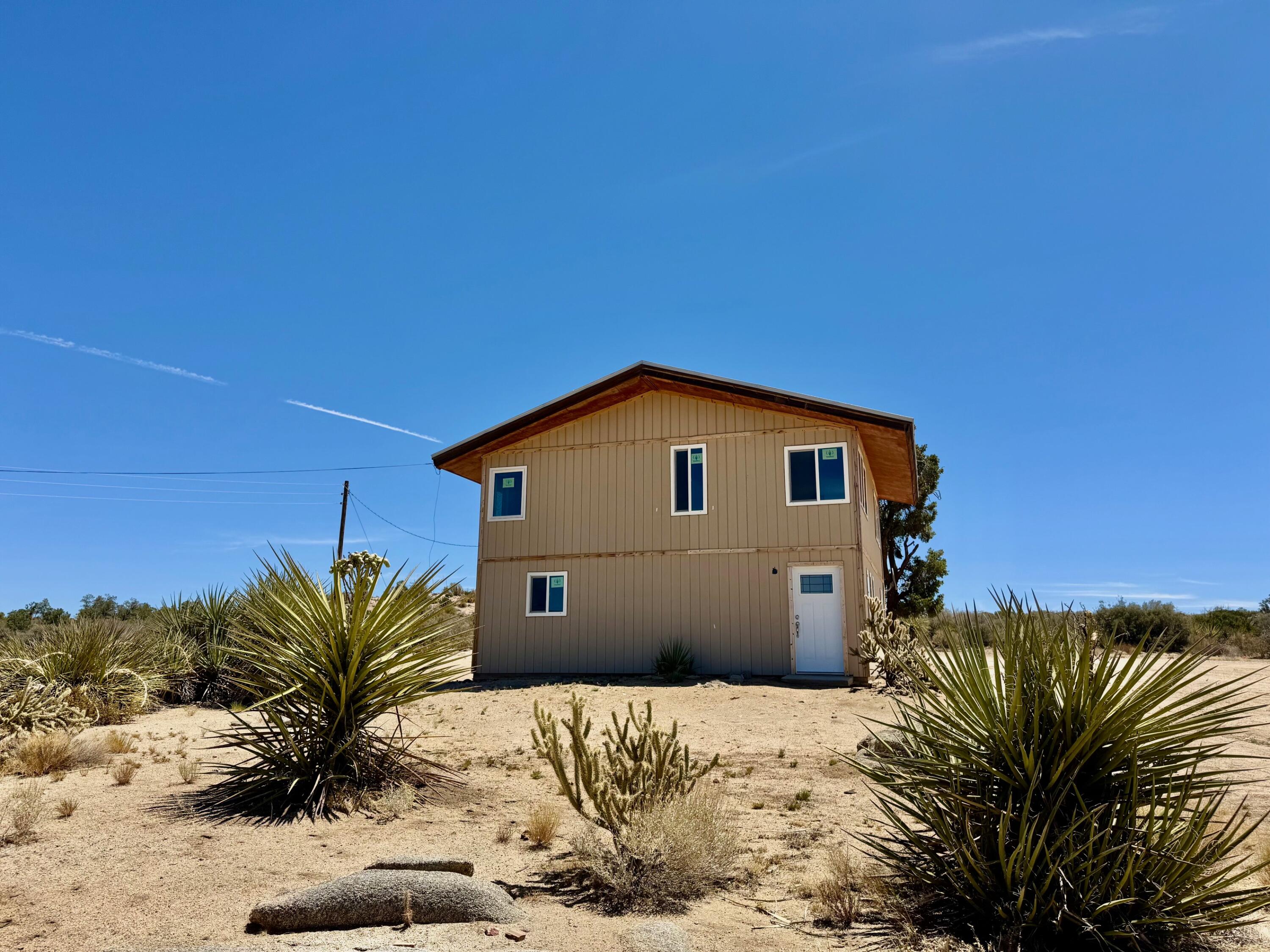 61550 Jeraboa Road Mountain Center, CA 92561 - Photo 2 of 13 a view of a house with a snow in the background