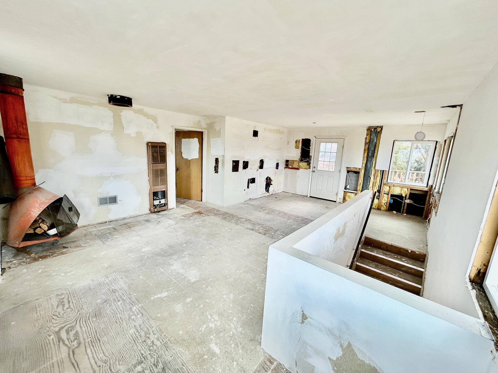 61550 Jeraboa Road Mountain Center, CA 92561 - Photo 5 of 13 a view of a hall way with furniture and gym equipment