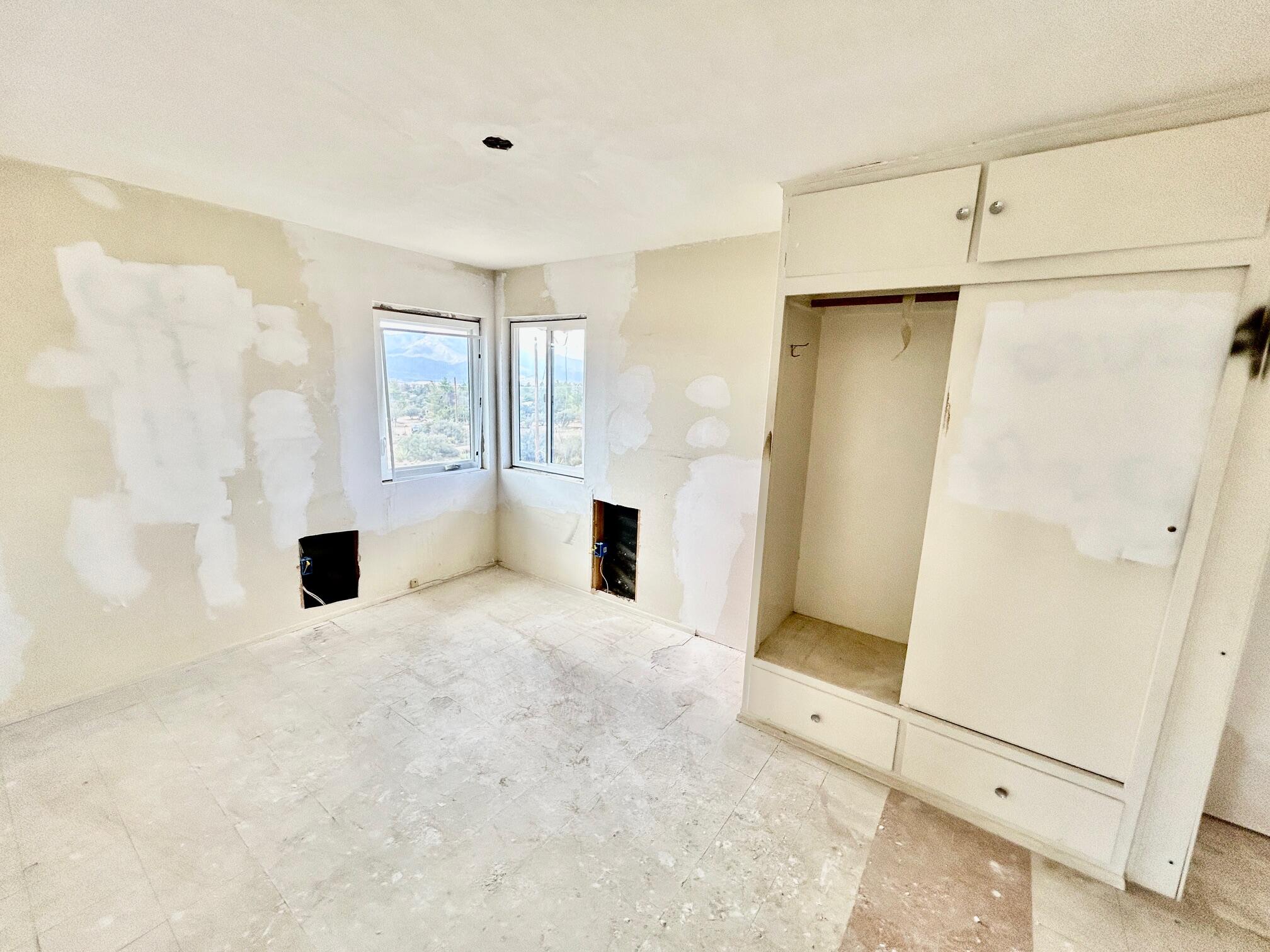 61550 Jeraboa Road Mountain Center, CA 92561 - Photo 7 of 13 a view of a livingroom with an empty space and a window