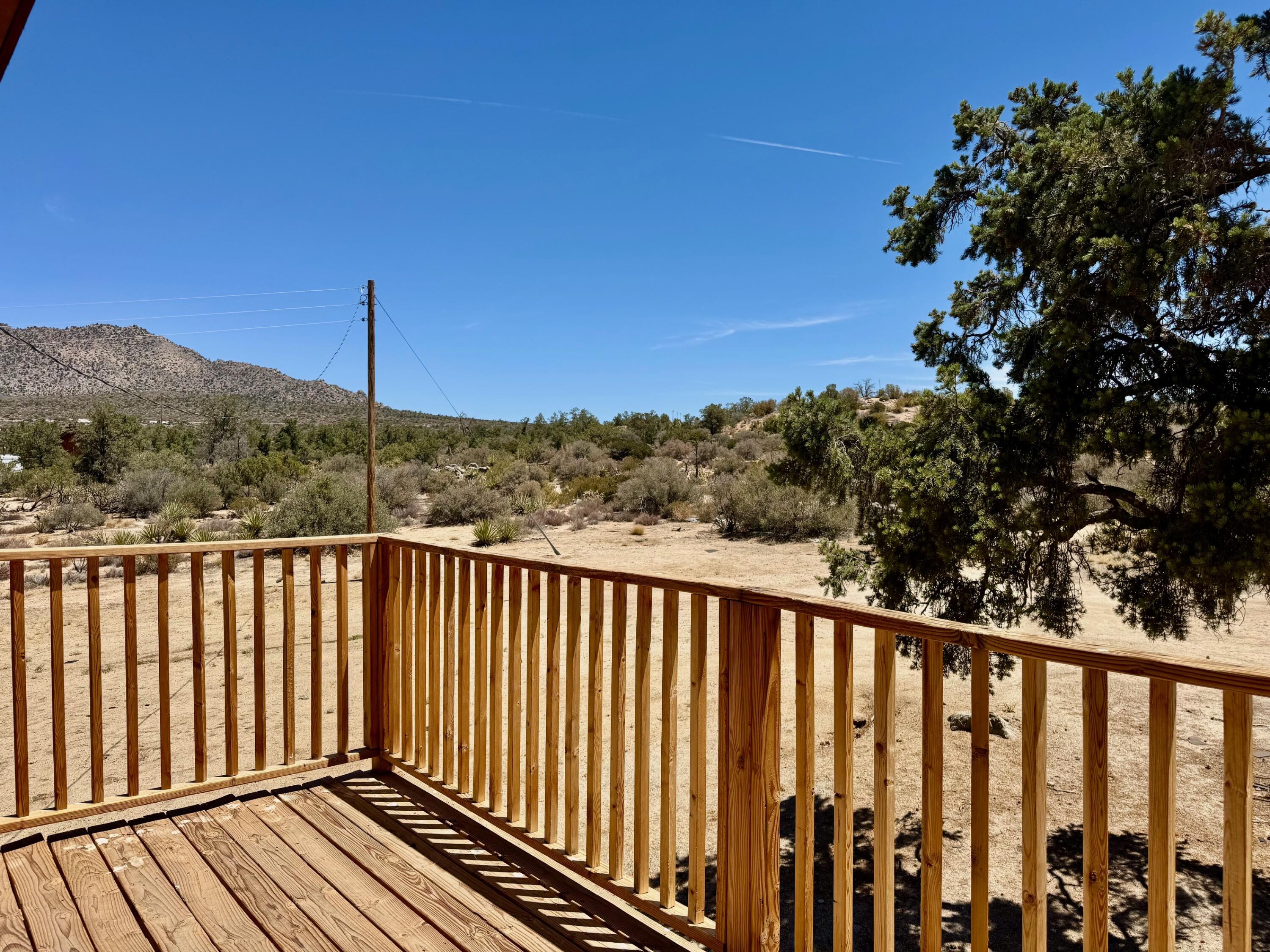 61550 Jeraboa Road Mountain Center, CA 92561 - Photo 10 of 13 a view of a wooden fence