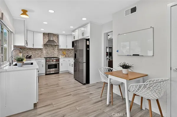 a bedroom with a bed and a view of bathroom