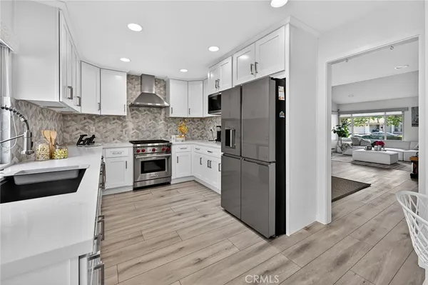 a room with furniture and a wooden floor