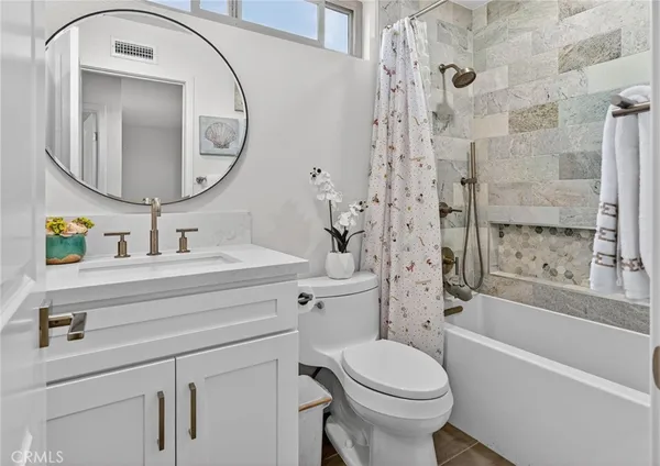 a view of kitchen island with furniture and wooden floor
