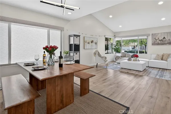 a living room with furniture and a table