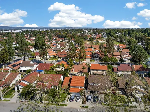 a view of a park with swings and slides