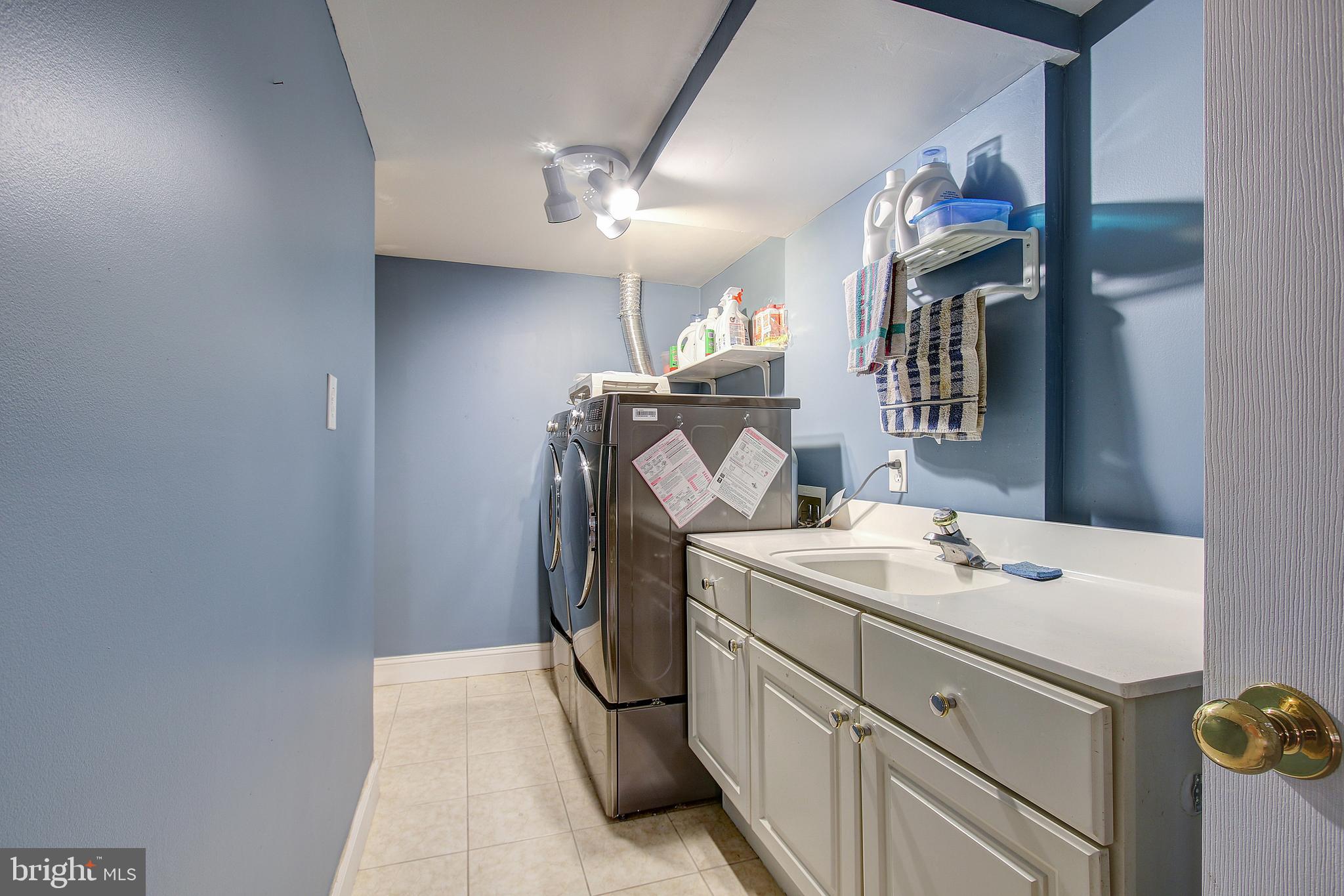 12011 Insha Court Reston, VA 20191 - Photo 28 of 33 Lower Level Laundry-and there's a full Bath!