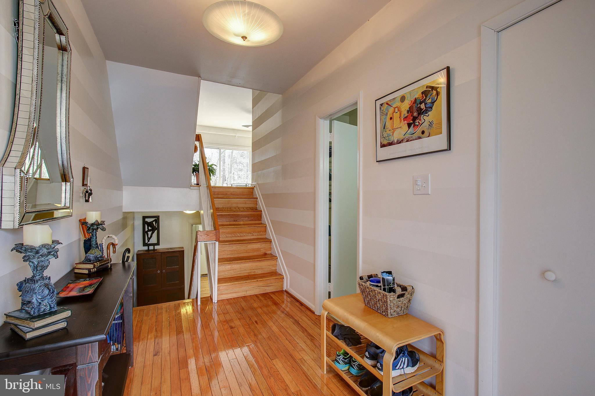 12011 Insha Court Reston, VA 20191 - Photo 6 of 33 Gleaming hardwood floors on all levels!