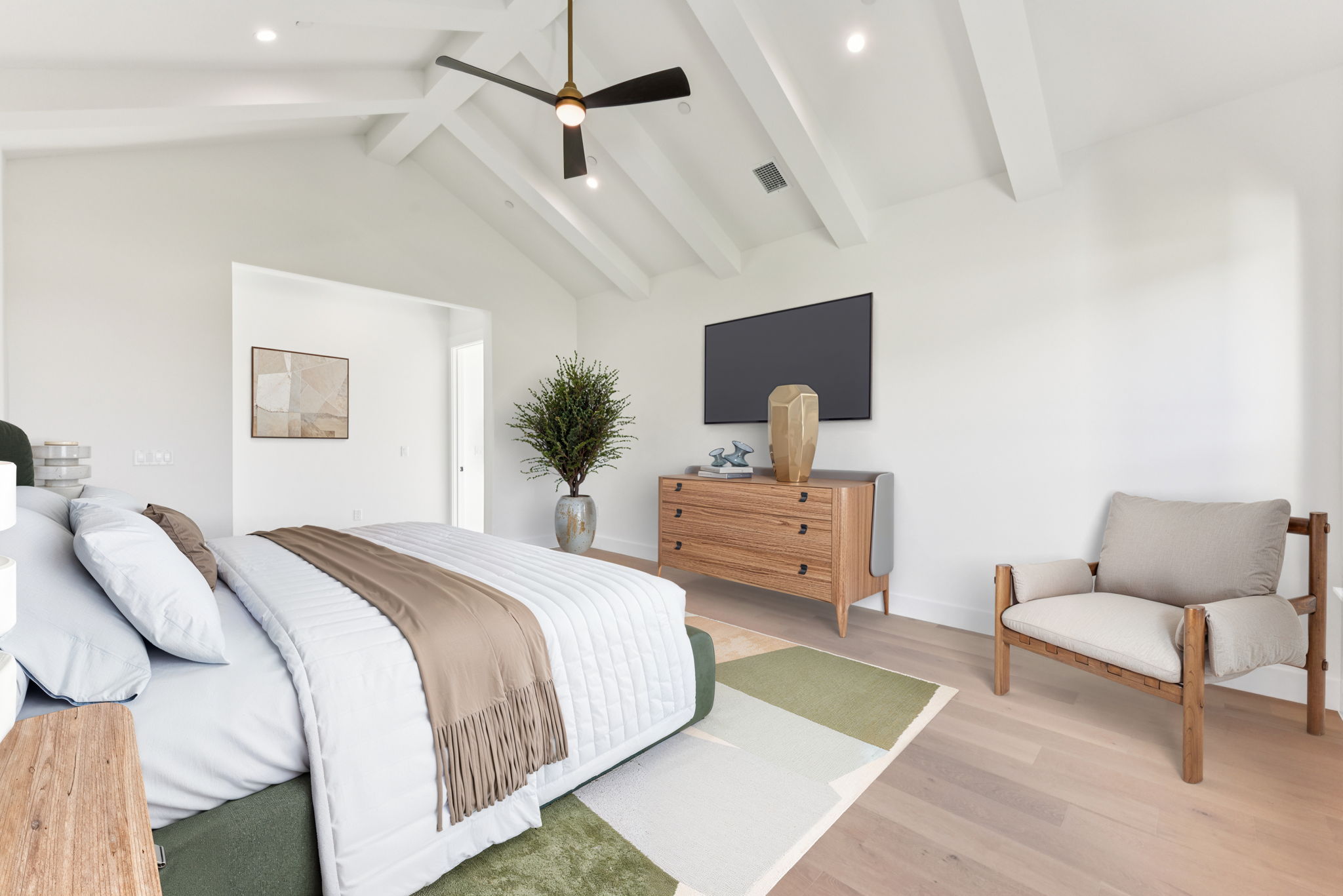 6010 Adhara Pass Austin, TX 78730 - Photo 13 of 38 a spacious bedroom with a bed and a couch