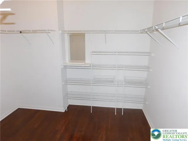 a view of an empty walk in closet