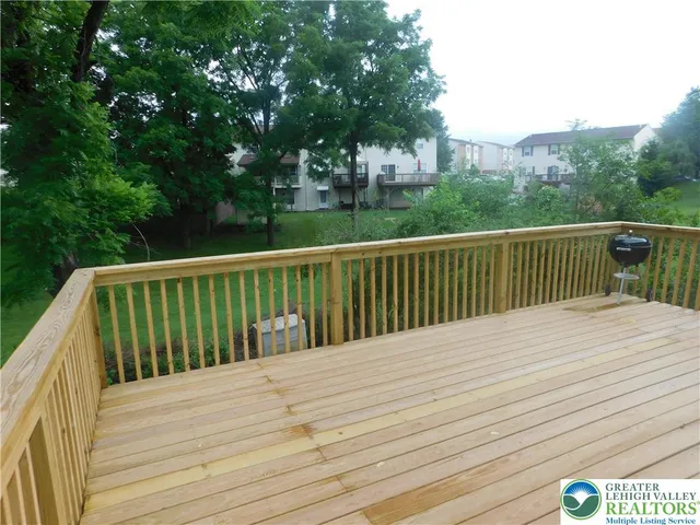 a view of balcony and yard