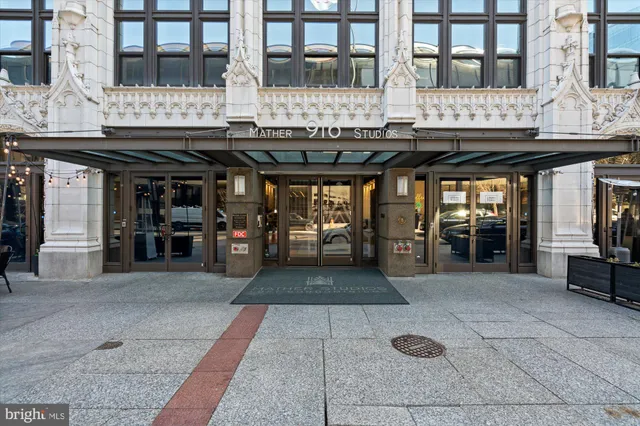a view of a building with sitting area