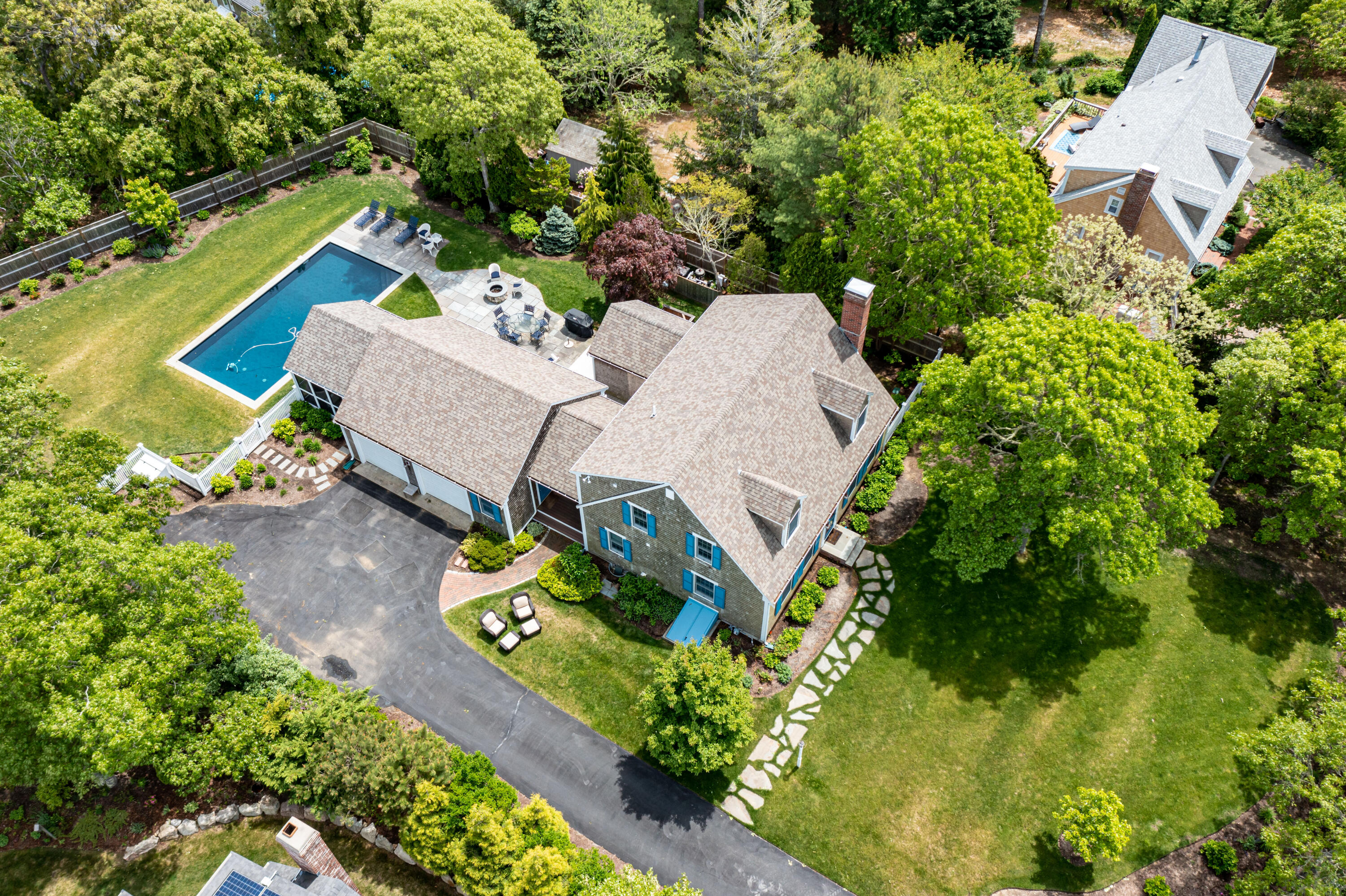88 Round Cove Road Chatham, MA 02633 - Photo 1 of 58 an aerial view of a house with a garden and swimming pool
