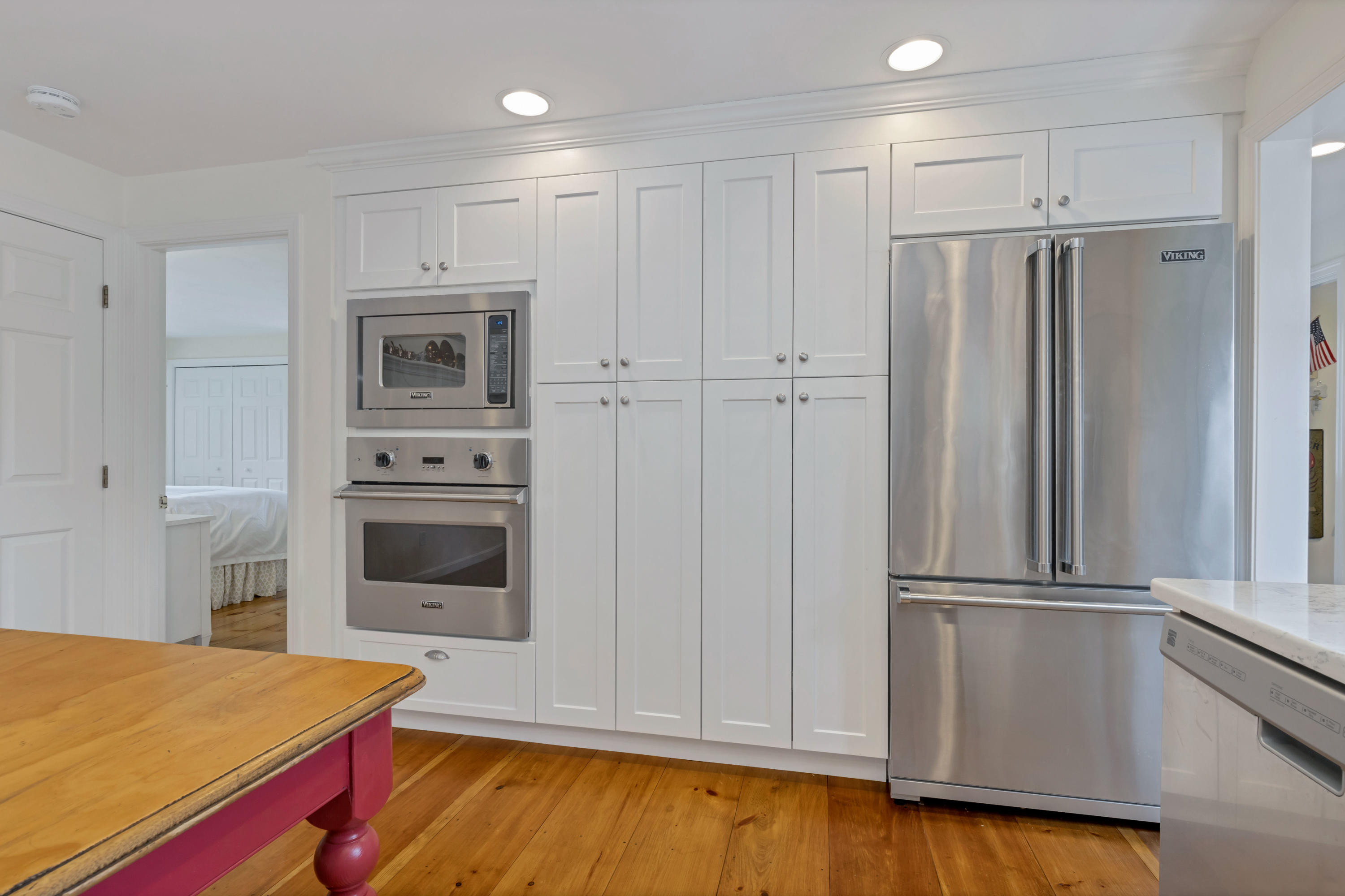 88 Round Cove Road Chatham, MA 02633 - Photo 17 of 58 a kitchen with stainless steel appliances a refrigerator and a stove top oven
