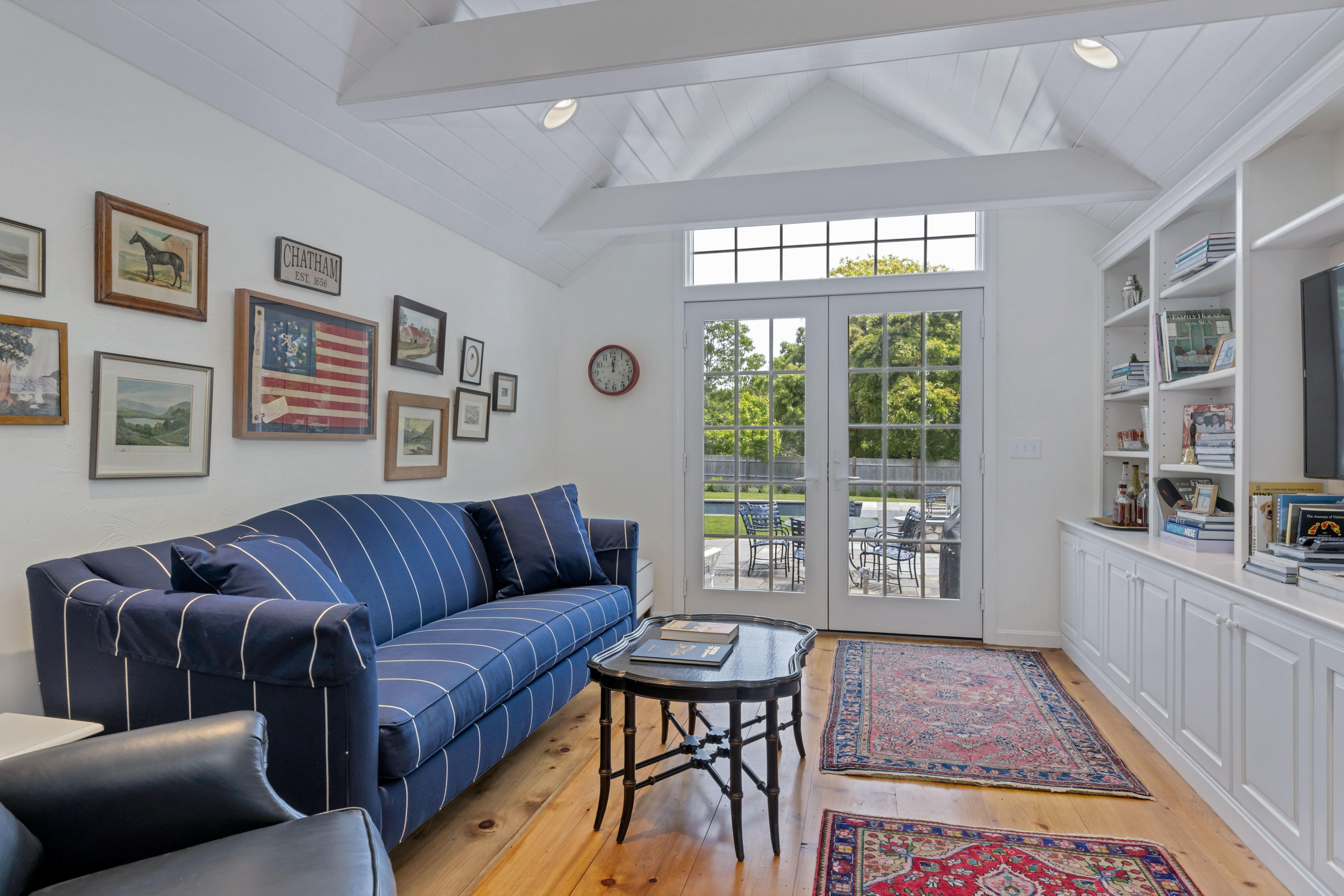 88 Round Cove Road Chatham, MA 02633 - Photo 19 of 58 a living room with furniture and a large window