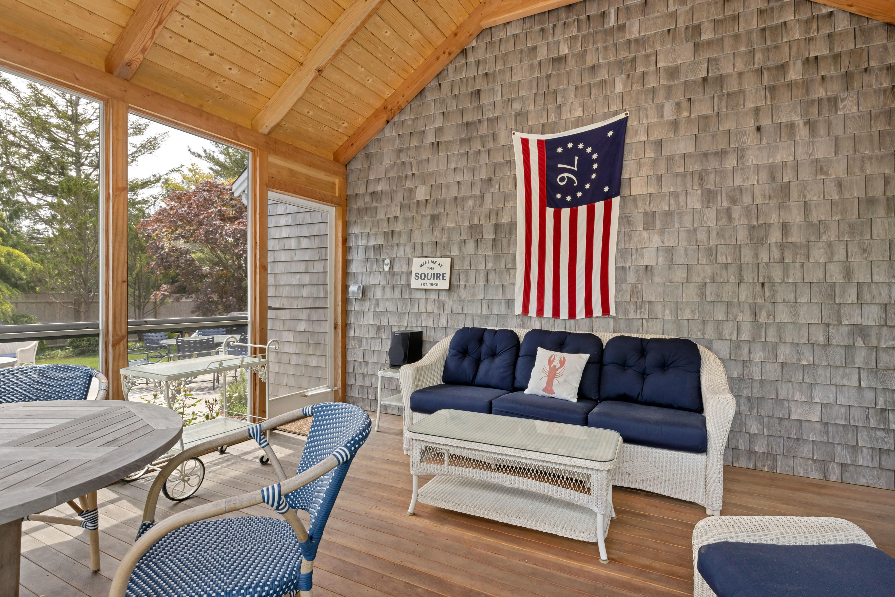 88 Round Cove Road Chatham, MA 02633 - Photo 29 of 58 a living room with furniture and a floor to ceiling window